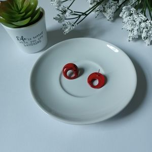 Round red acrylic studs